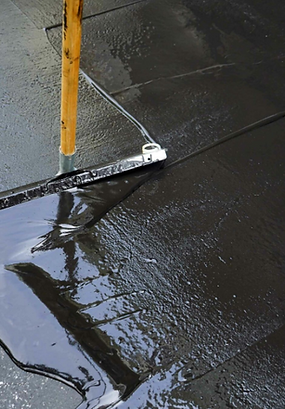 Residential driveway sealcoating